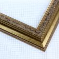 The 2 " Reverse with Compo Panel in Gold features a deep, traditional profile with ornate embossed detailing that adds richness and dimension to artwork or photography. Its deep gold finish and classic decorative edge create a refined presentation suited for both contemporary and traditional displays.

2 " width: ideal for medium- to large-size images. The detailed nature of this frame makes it suitable for bright or busy paintings or photographs. It may overpower simpler images.
