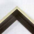 This medium, L-shaped floating contemporary canvas frame in matte black features a thin open grain natural wood face, and 1-3/4 " depth.

*Note: These solid wood, custom canvas floaters are for stretched canvas prints and paintings, and raised wood panels.